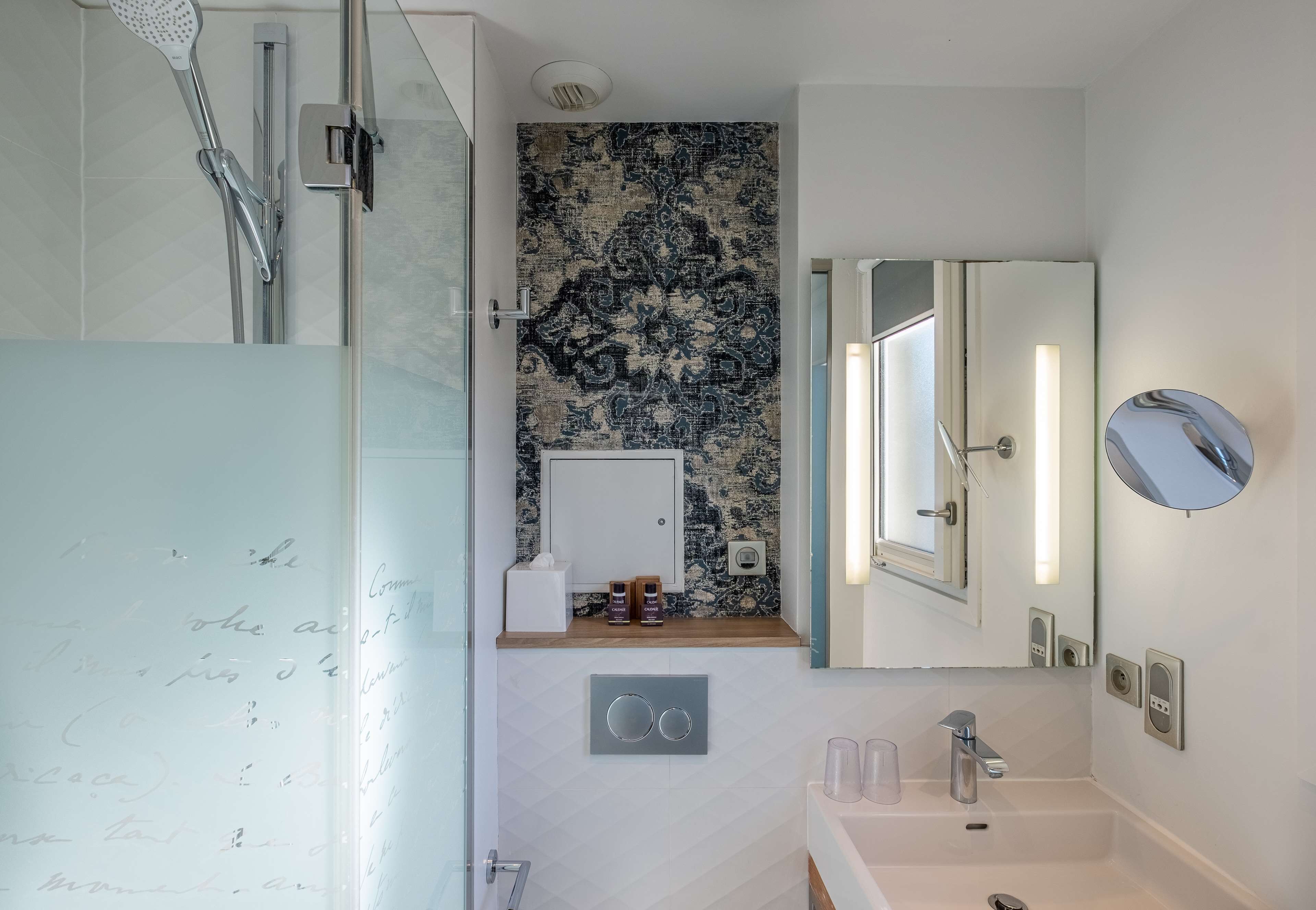 deep-soaking bathtub, rainfall showerhead, free toiletries, hair dryer