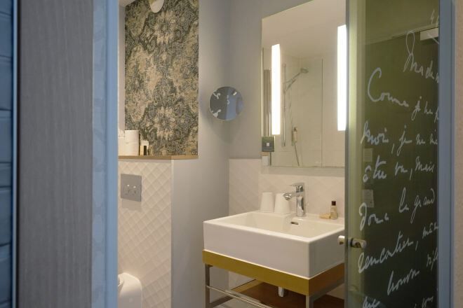 Bathroom | Deep-soaking bathtub, rainfall showerhead, free toiletries, hair dryer