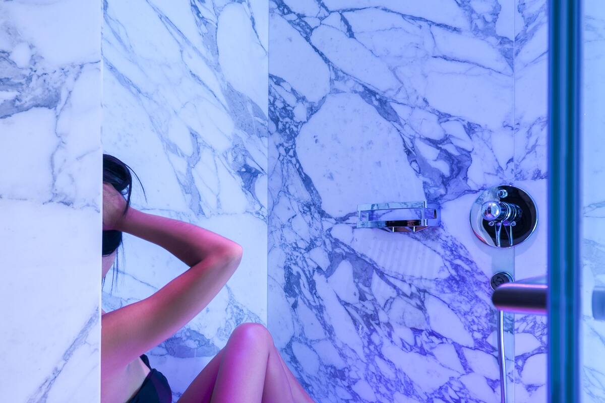 penthouse (suite) | bathroom | rainfall showerhead, free toiletries, hair dryer, slippers