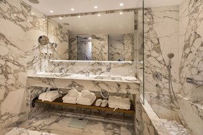 Penthouse (Suite) | Bathroom | Rainfall showerhead, free toiletries, hair dryer, slippers