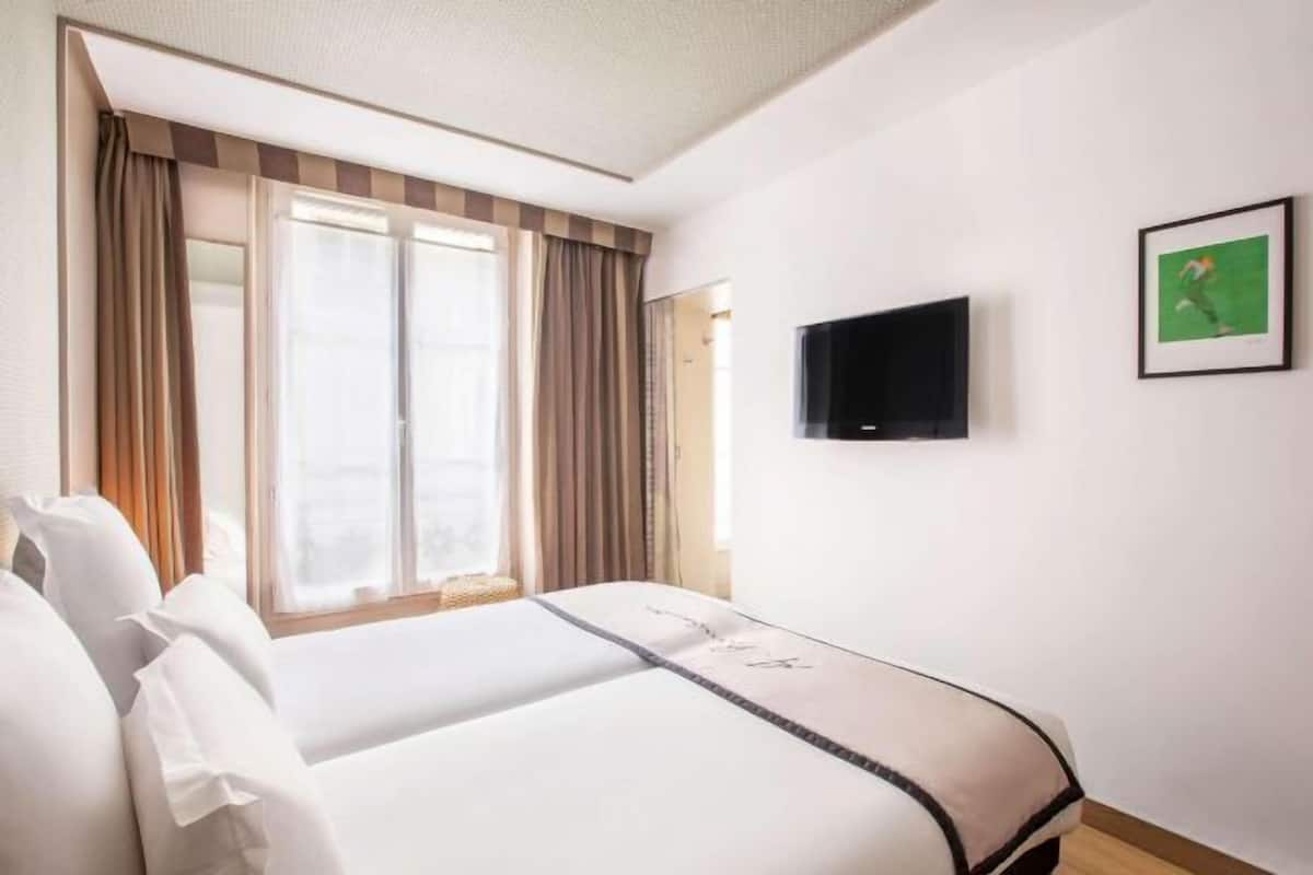 Premium bedding, in-room safe, desk, soundproofing