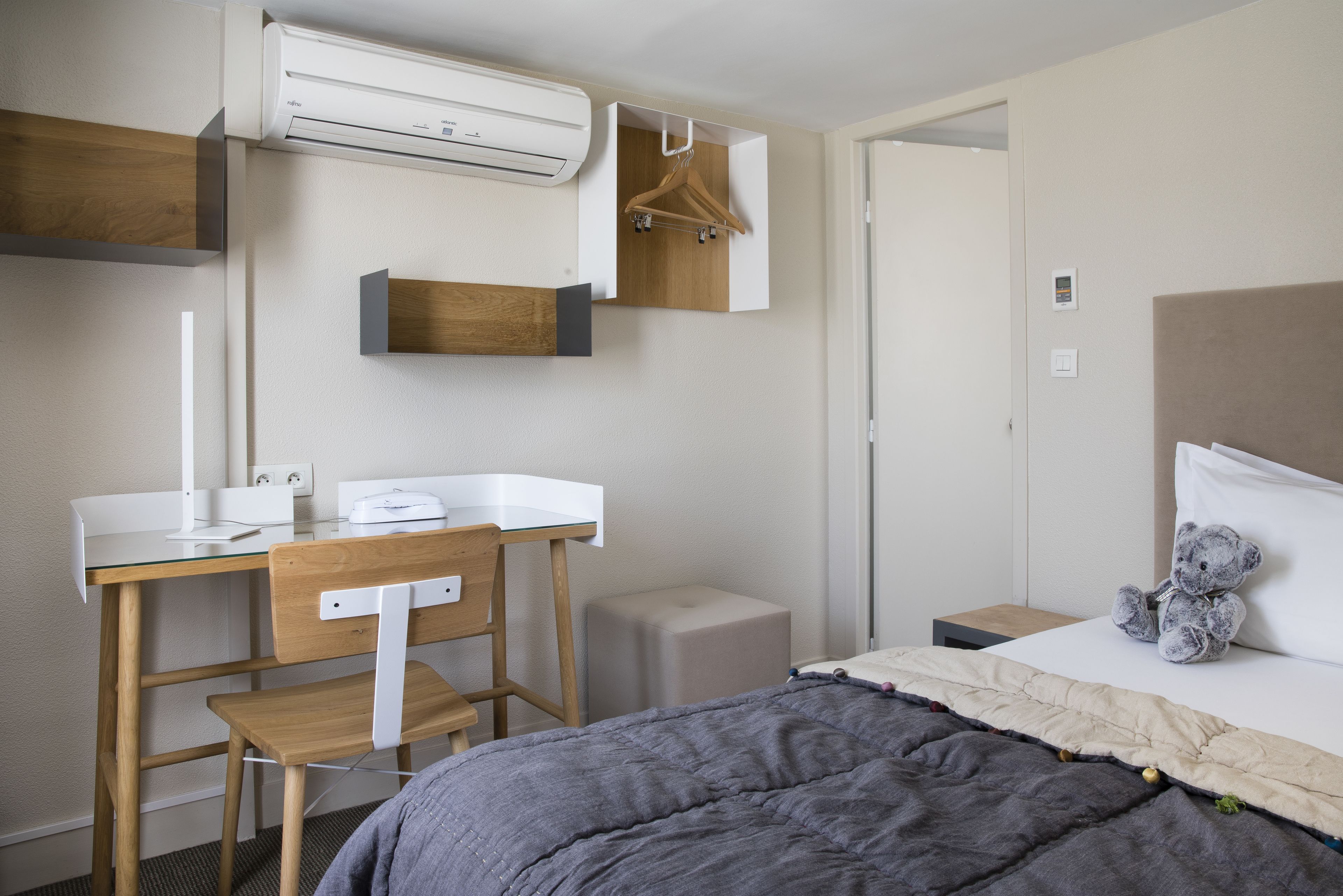 cosy triple room  | premium bedding, in-room safe, individually furnished