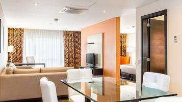 Standard Room | Living area | 32-inch LCD TV with satellite channels, TV