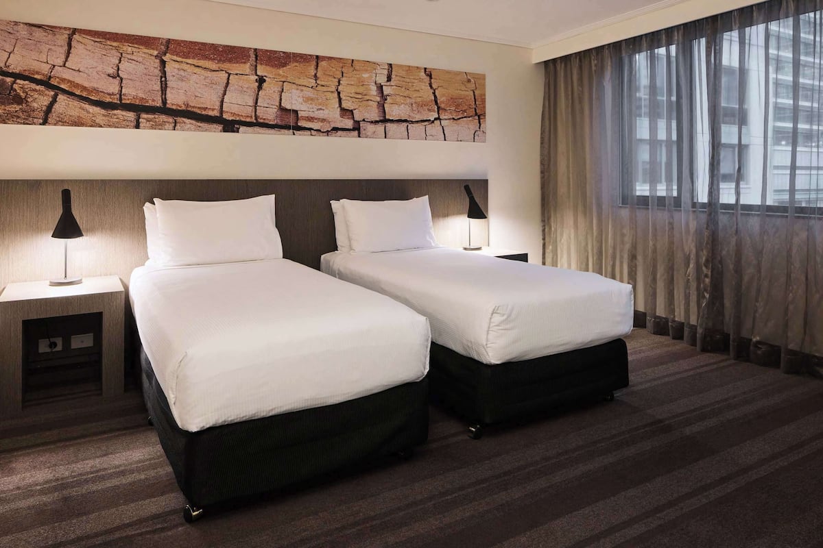 deluxe quadruple room | 1 bedroom, premium bedding, select comfort beds, minibar