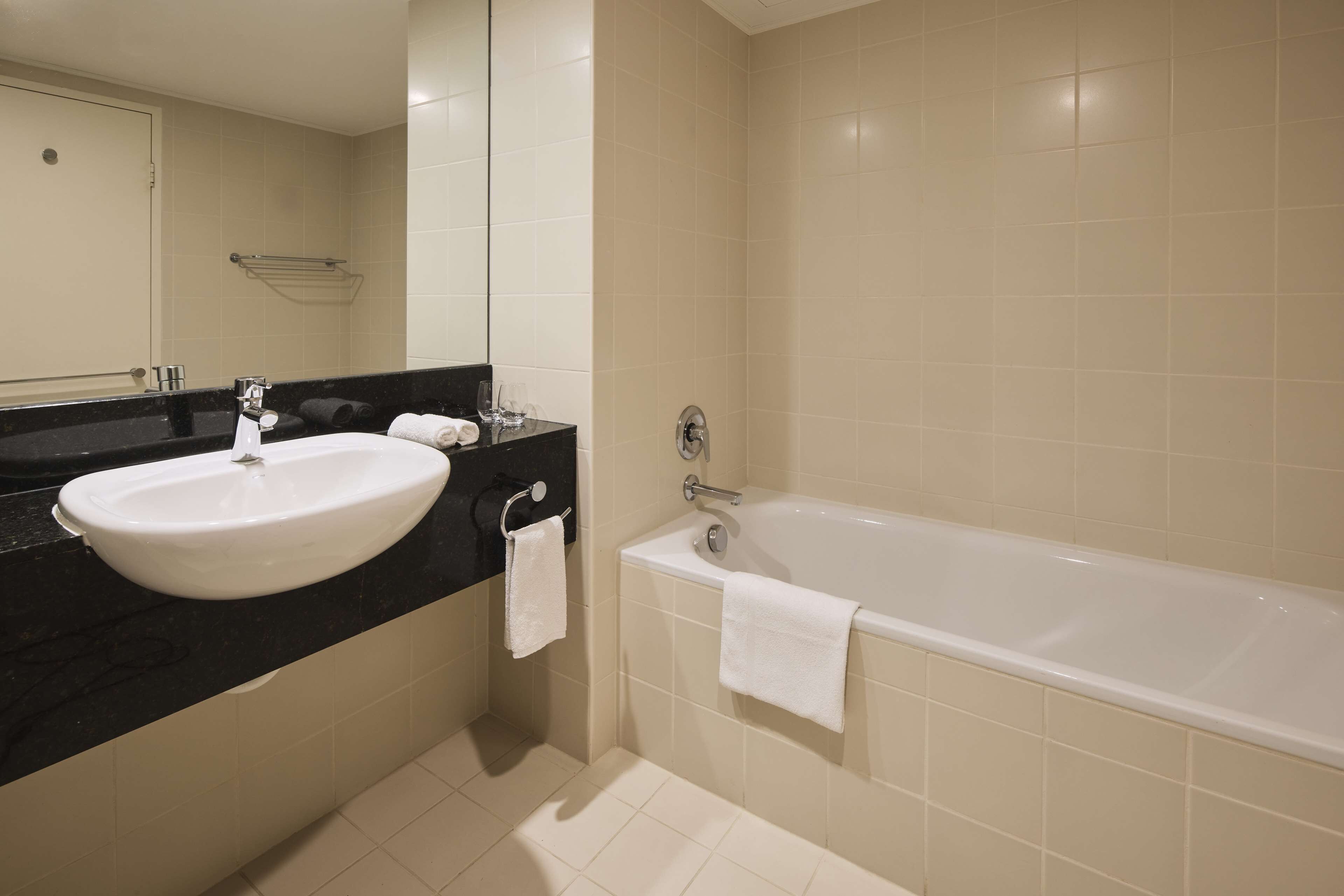 separate bathtub and shower, free toiletries, hair dryer, towels