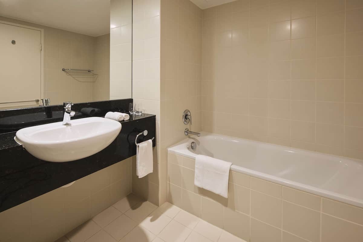 separate bathtub and shower, free toiletries, hair dryer, towels