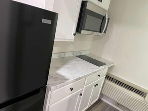 Deluxe kamer | Privékeuken | Een koelkast, een magnetron, milieuvriendelijke schoonmaakproducten