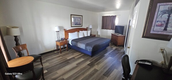 1 King Bed, Non Smoking | Desk, blackout drapes, iron/ironing board, free WiFi