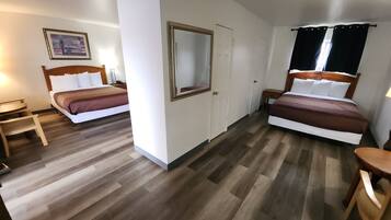 Grand Room | Desk, blackout drapes, iron/ironing board, free WiFi