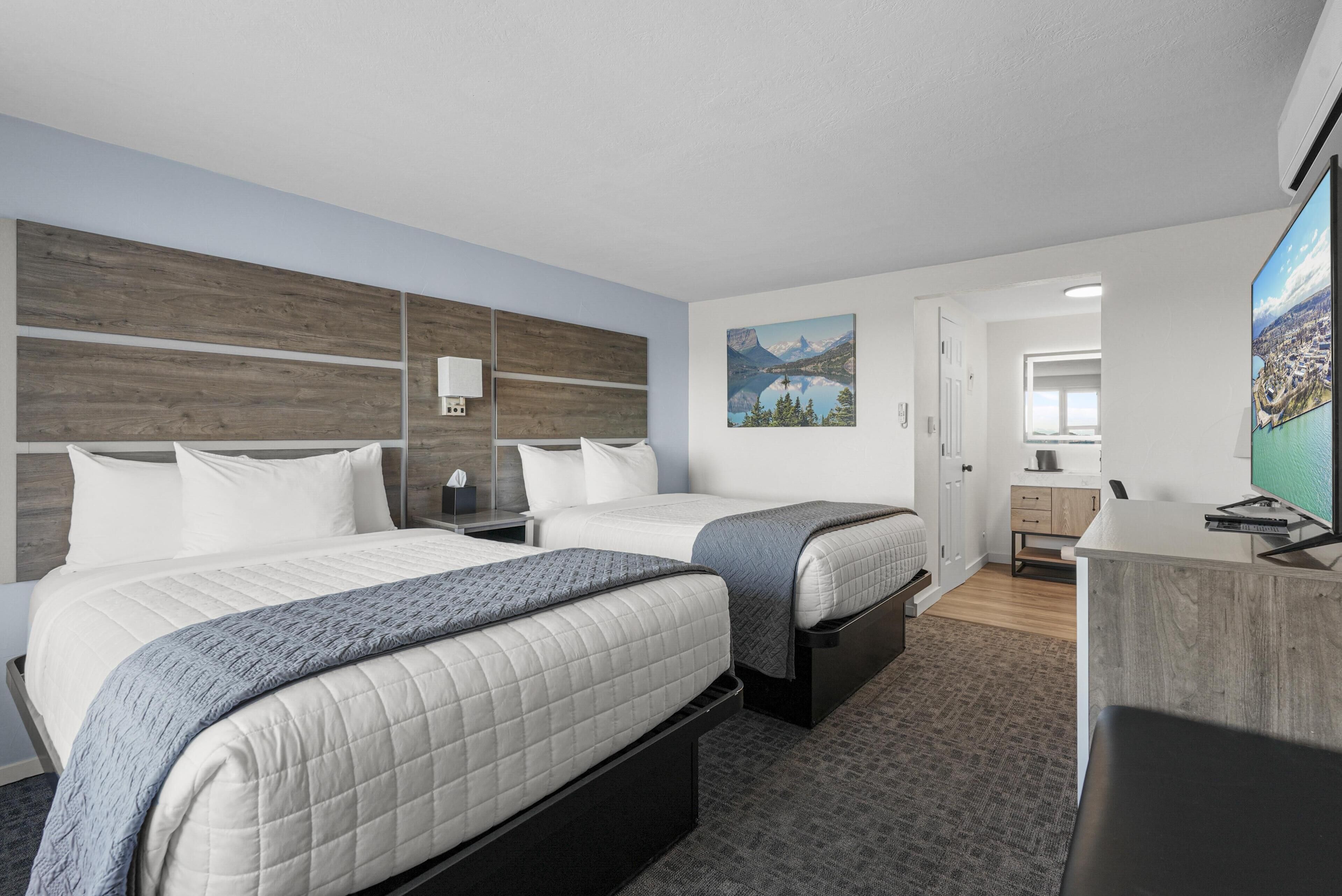 Rom, 2 dobbeltsenger, utsikt mot innsjø (Partial) | Sengetøy av topp kvalitet, strykejern/-brett og barnesenger