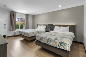 Blackout drapes, free WiFi, bed sheets