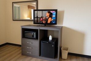 Luxury Room | Living area | 43-inch TV with digital channels