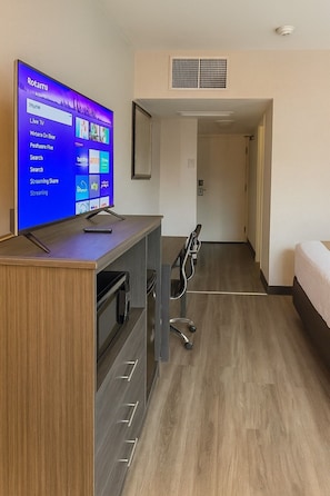 Standard Room, 2 Queen Beds | Living area | 43-inch TV with digital channels