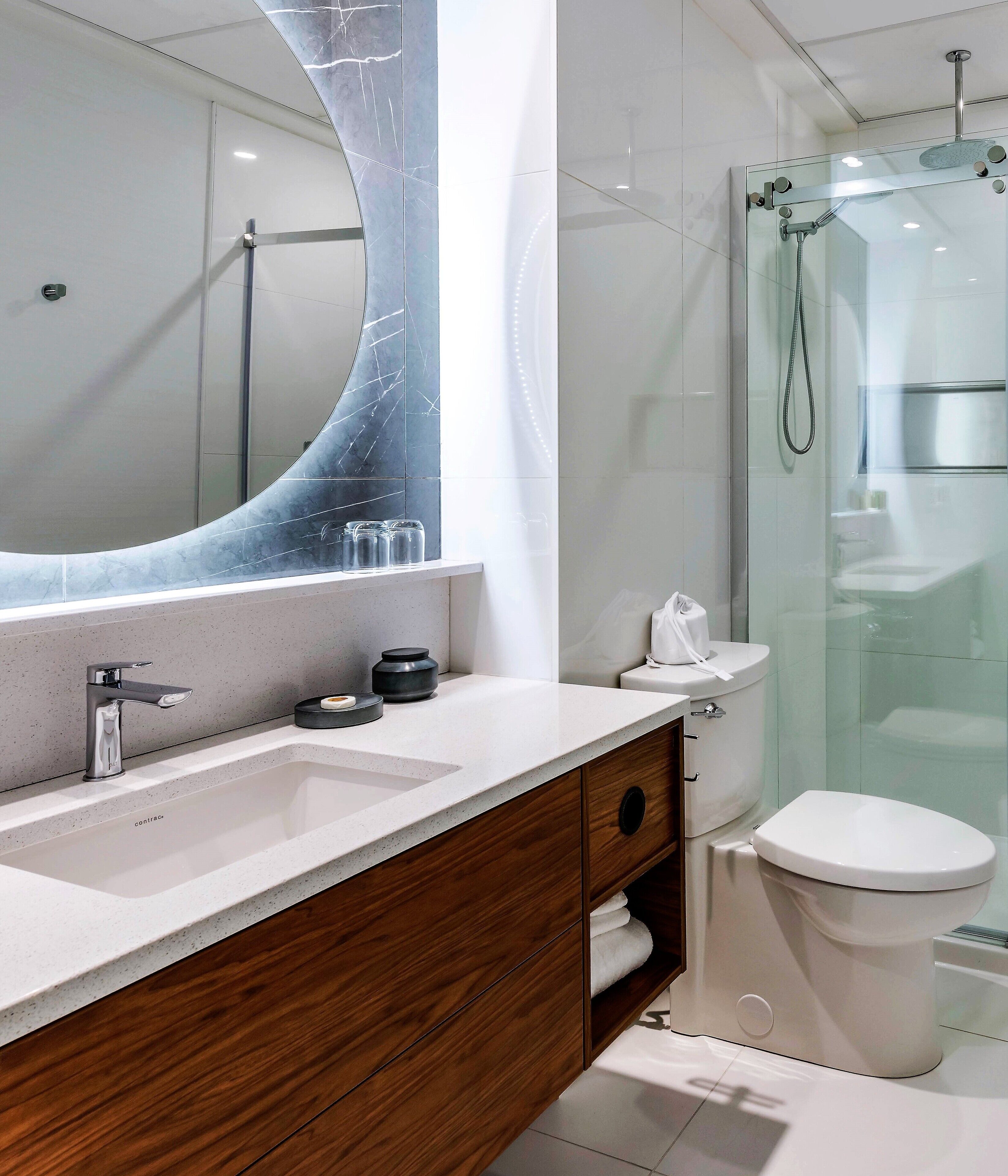 combined shower/bathtub, rainfall showerhead, designer toiletries