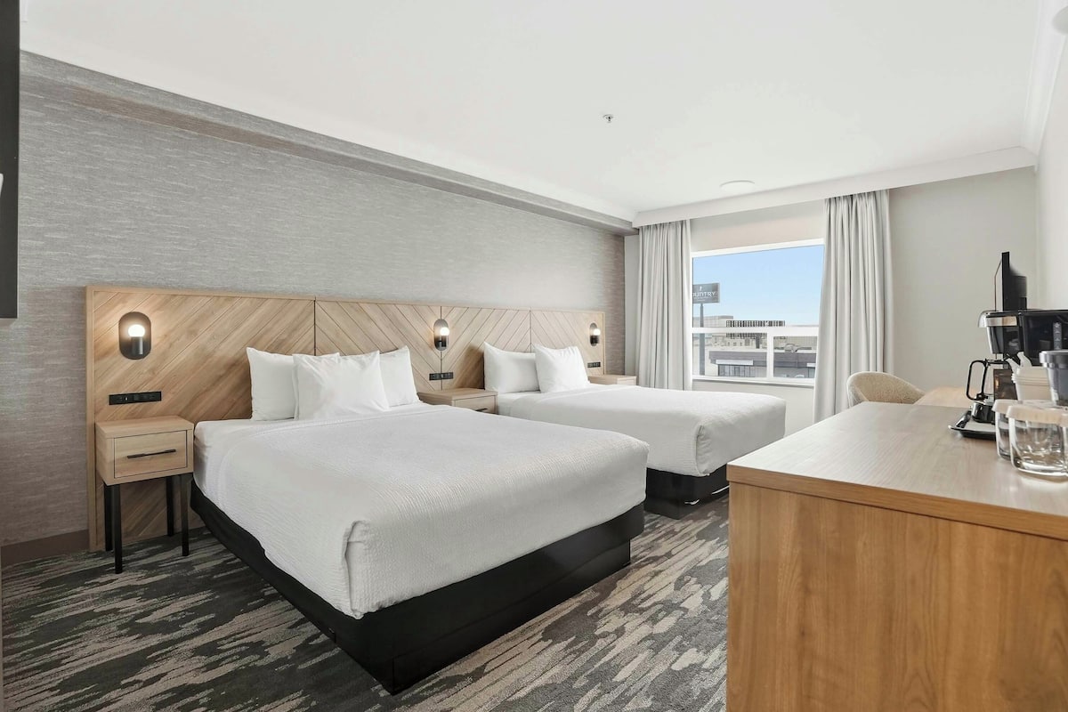 Desk, laptop workspace, blackout drapes, iron/ironing board