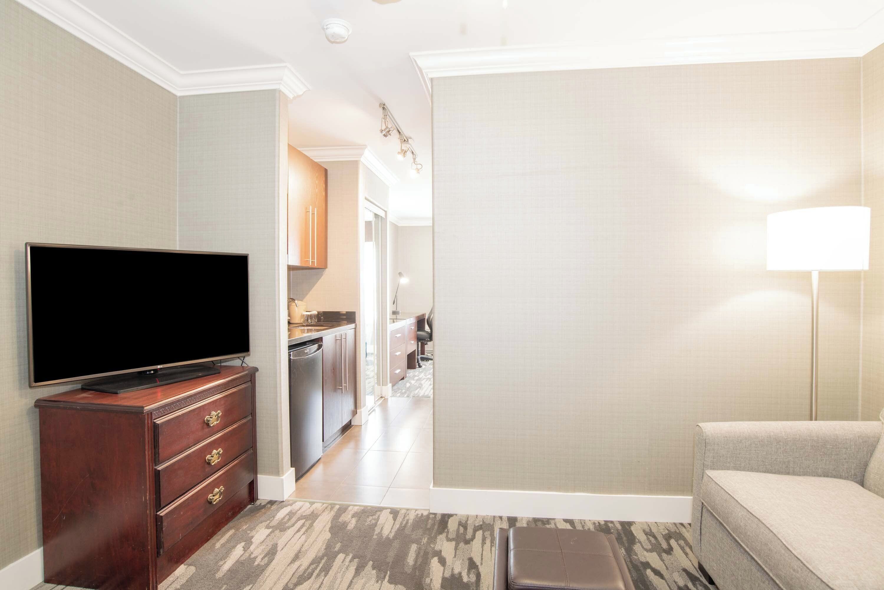 standard suite, 1 king bed, kitchenette (sofa bed) | 1 bedroom, desk, laptop workspace, blackout curtains