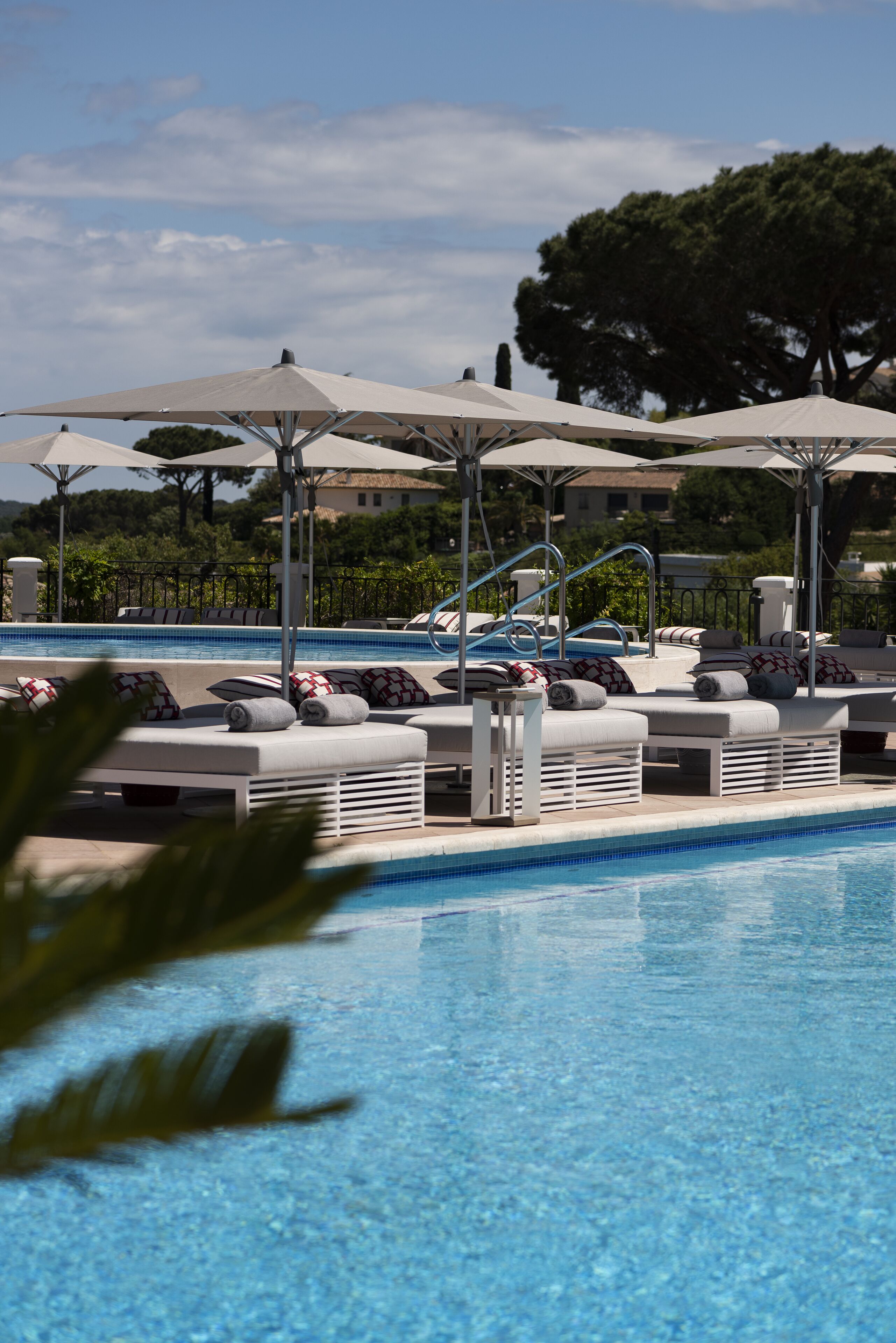 2 outdoor pools, pool umbrellas, pool loungers