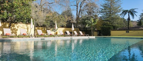 Indoor pool, outdoor pool, pool umbrellas, sun loungers