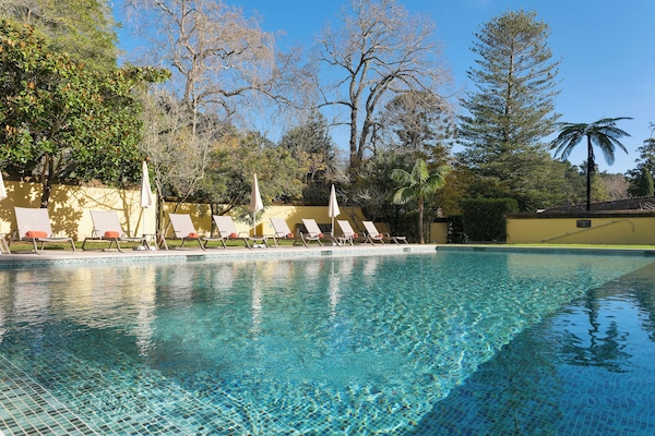 Indoor pool, outdoor pool, pool umbrellas, sun loungers