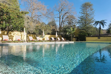 Indoor pool, outdoor pool, pool umbrellas, sun loungers