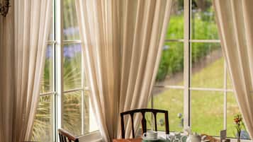 Breakfast, lunch, dinner served; international cuisine, garden views