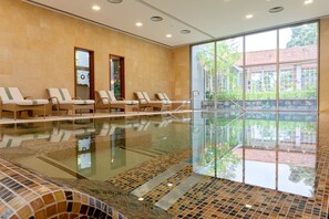 Indoor pool, outdoor pool, pool umbrellas, sun loungers