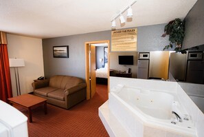Luxury Suite, 1 King Bed, Non Smoking (One-Bedroom) | Bathroom | Combined shower/bathtub, deep-soaking bathtub, free toiletries