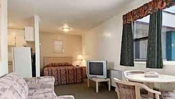 Desk, laptop workspace, blackout curtains, iron/ironing board