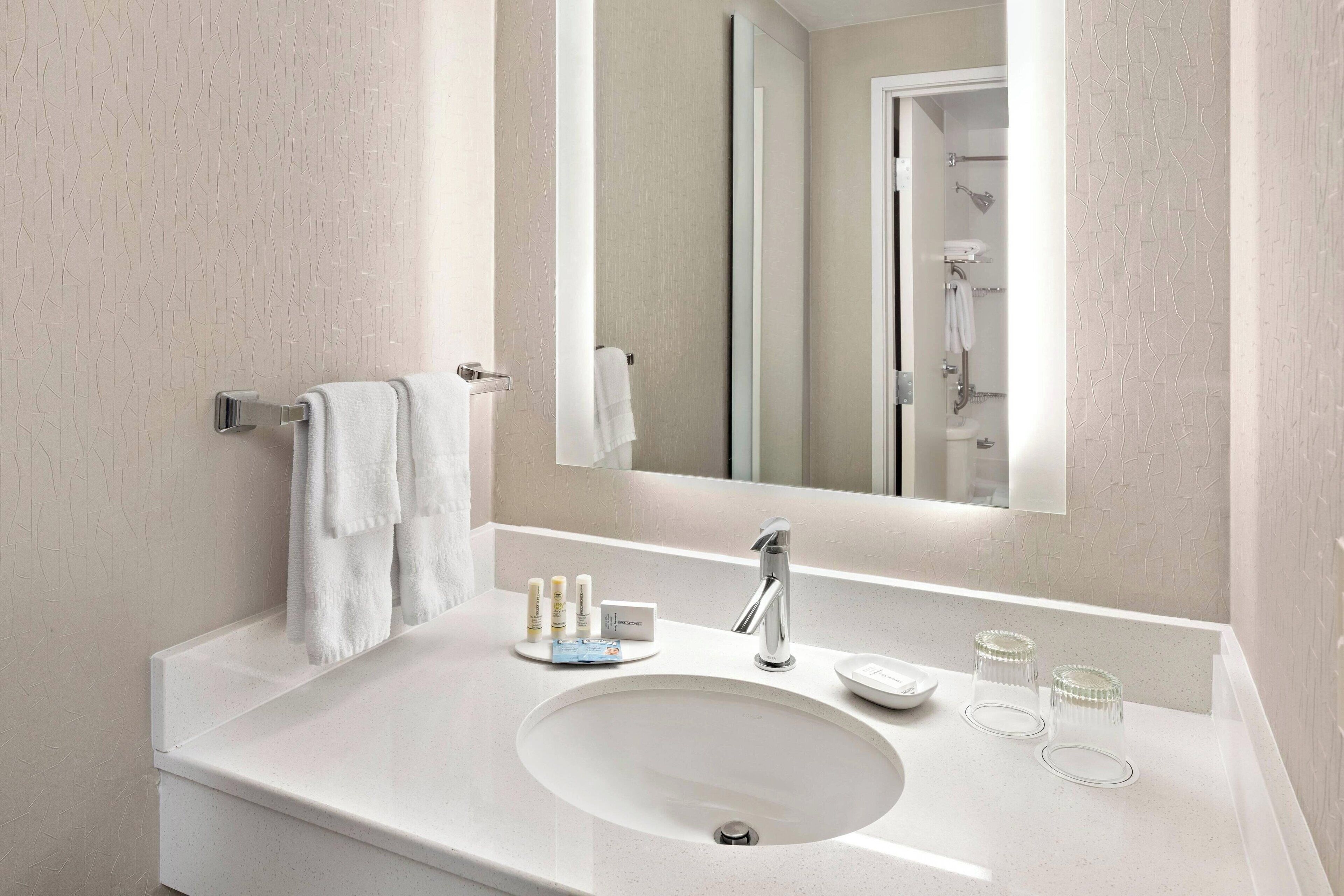 combined shower/bathtub, free toiletries, hair dryer, towels