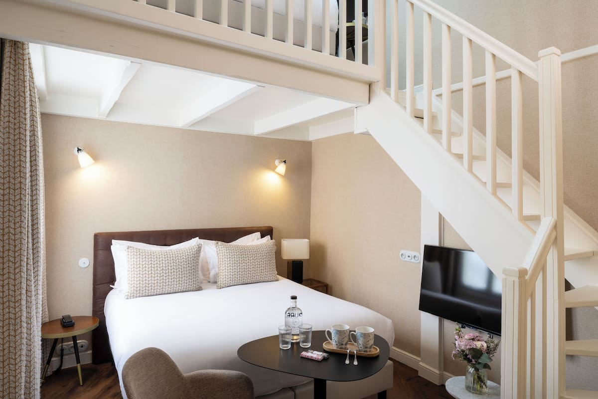 Appartement Duplex | Literie de qualité supérieure, minibar, coffres-forts dans les chambres