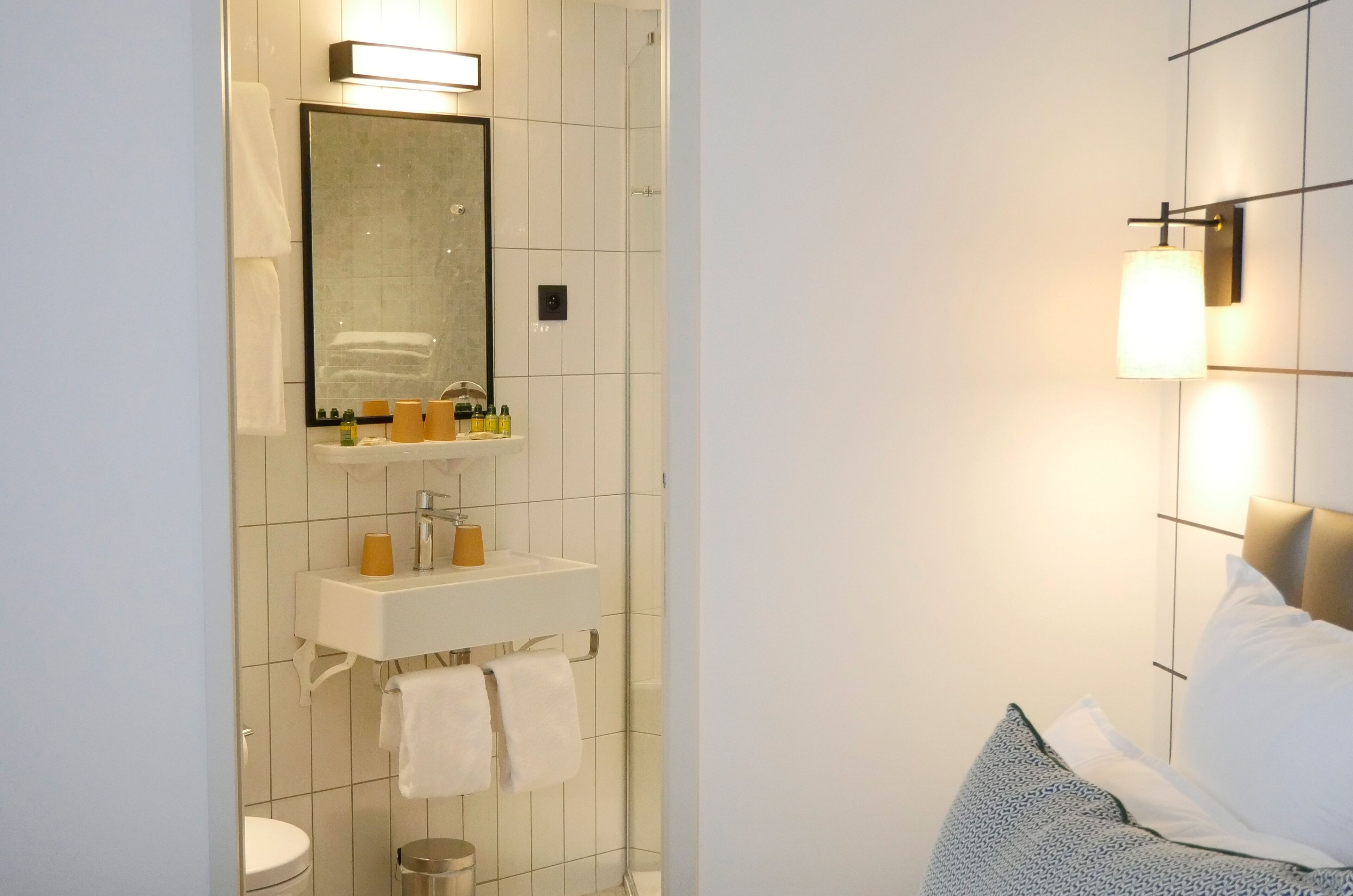 shower, rainfall showerhead, hair dryer, towels