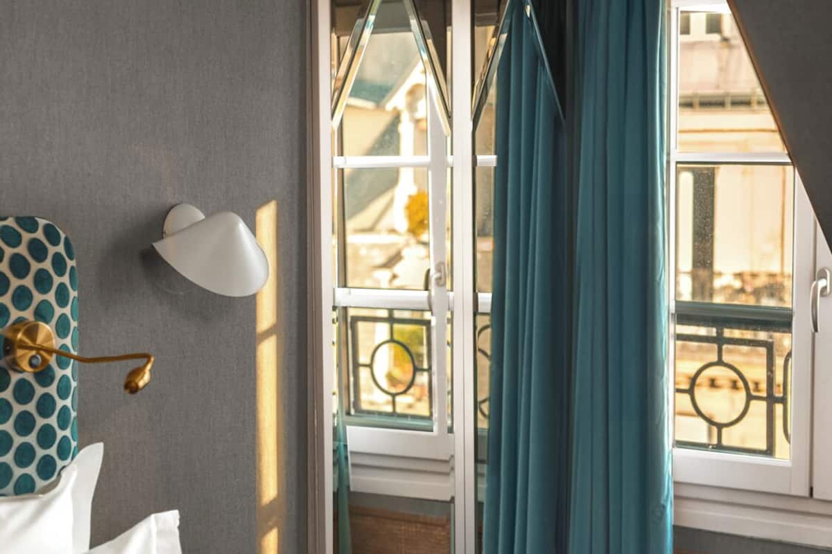 Deluxe Double Room (Handsome) | In-room safe, individually decorated, desk, iron/ironing board