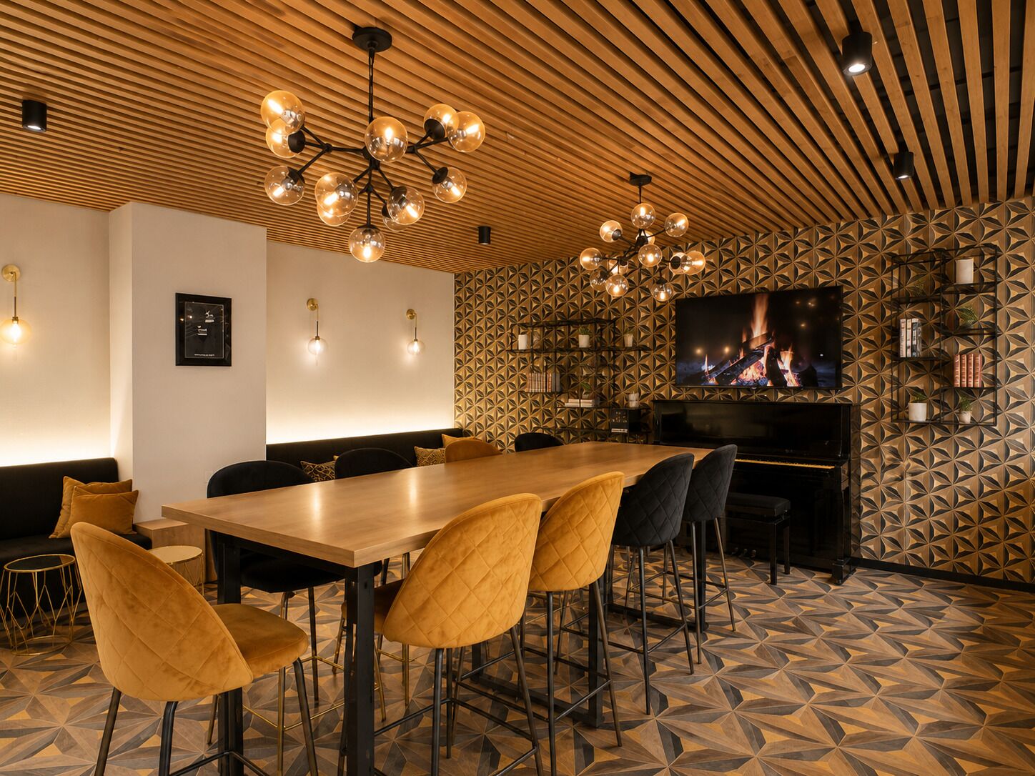 A modern interior with a wooden ceiling, geometric patterned walls, a long dining table, and bar stools.