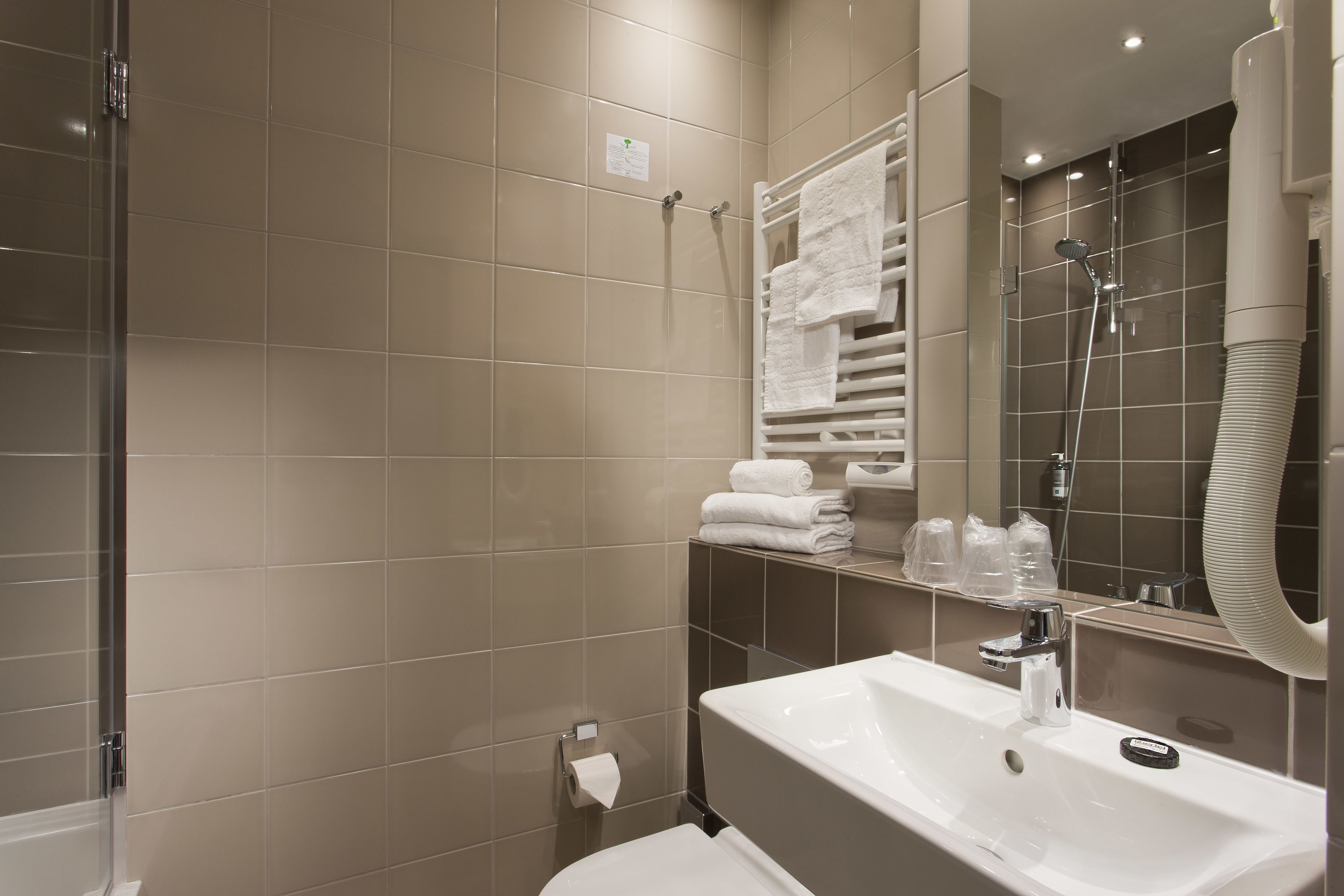 family room | bathroom | hair dryer, towels, soap, toilet paper