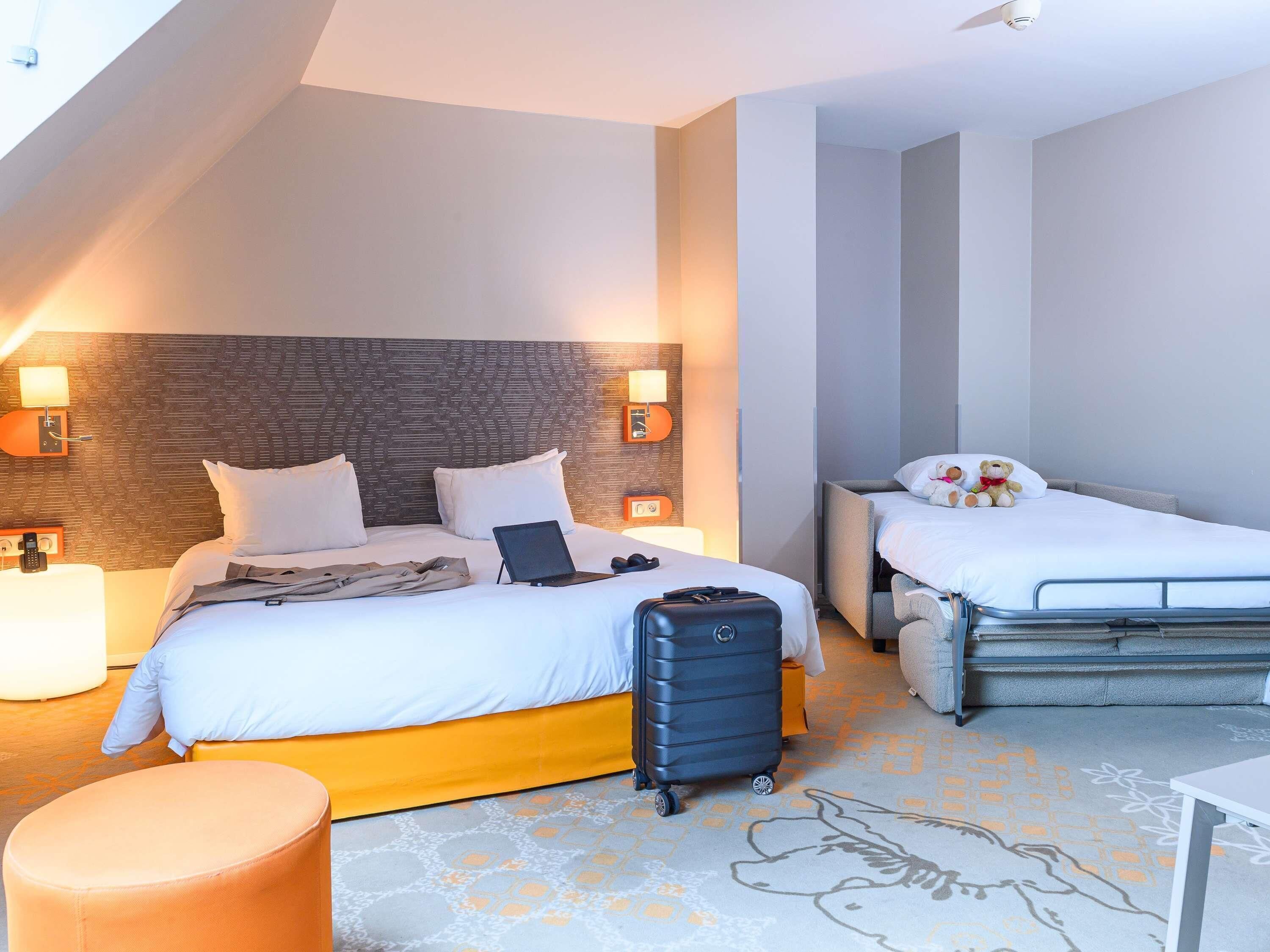 Superior Family room with 1 double bed, 1 sofa bed and 1 single bed | Premium bedding, desk, blackout drapes, soundproofing