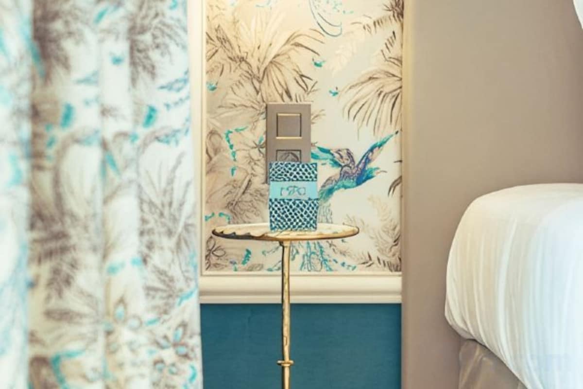 Luxe beddengoed, een kluis op de kamer, een strijkplank/strijkijzer