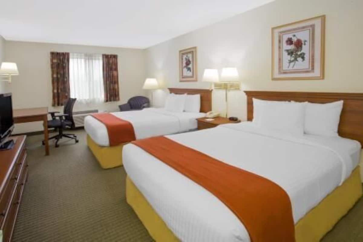 Premium bedding, desk, iron/ironing board, rollaway beds