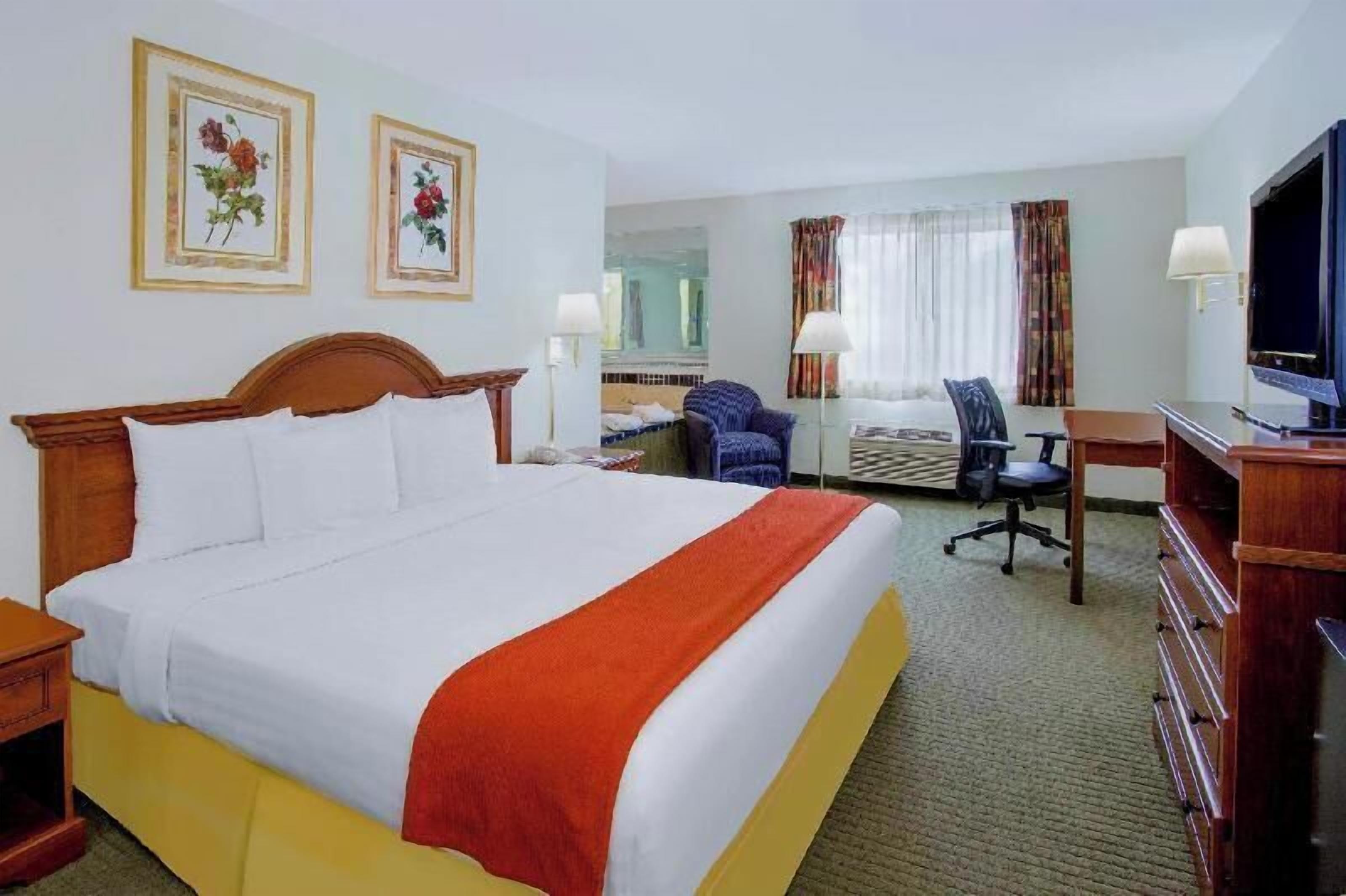 Premium bedding, desk, iron/ironing board, rollaway beds