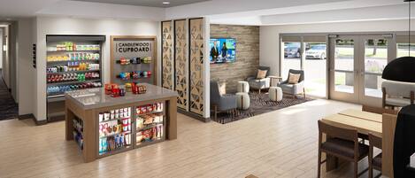 A modern lobby with a coffee shop, seating area, and a TV screen displaying a news program.