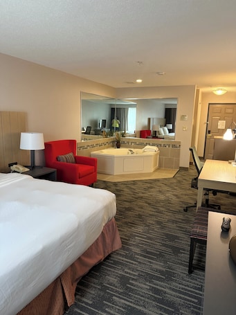 Suite, 1 King Bed, Non Smoking, Jetted Tub | Desk, blackout drapes, iron/ironing board, free internet