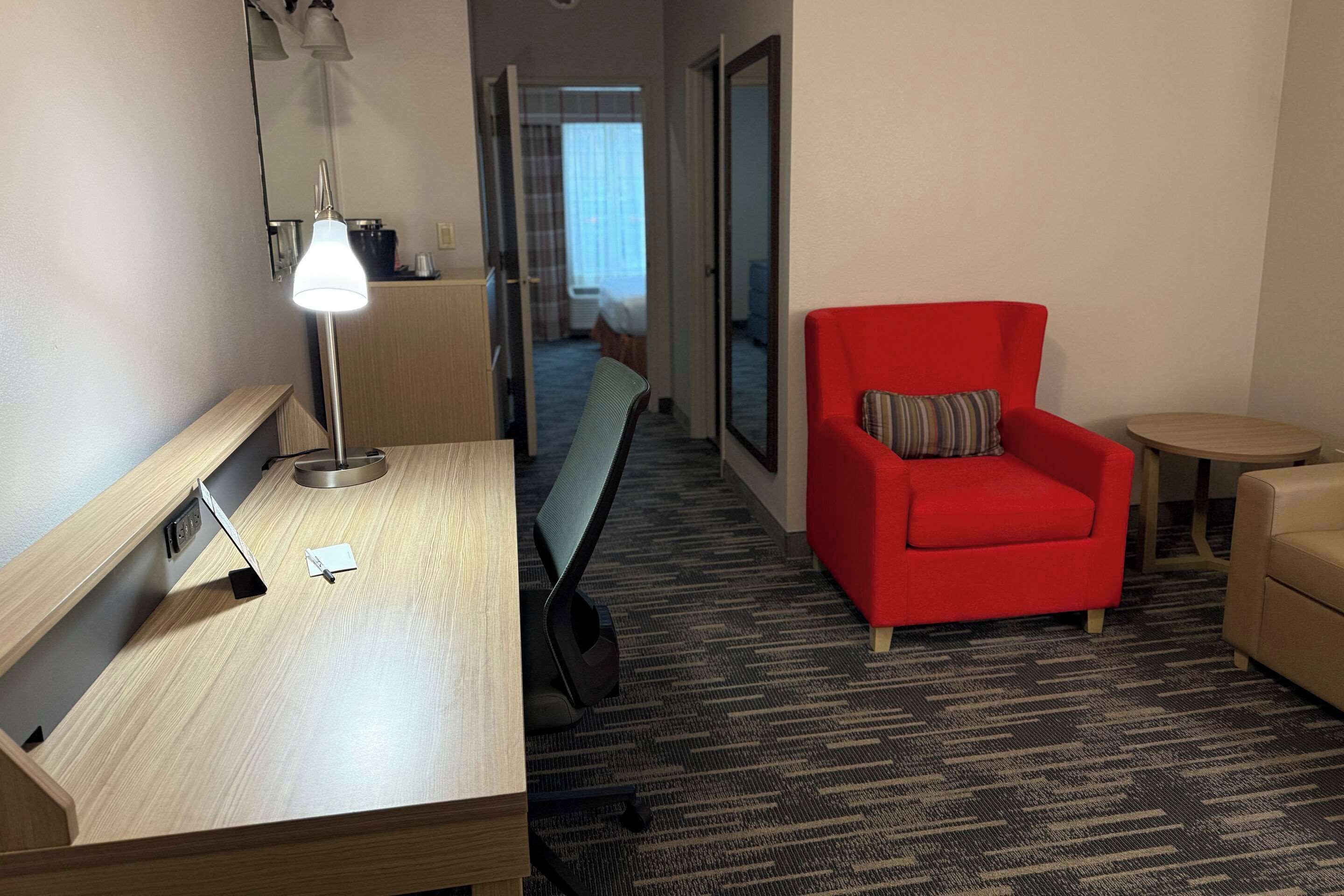 suite, 1 king bed, non smoking | 1 bedroom, desk, blackout curtains, iron/ironing board