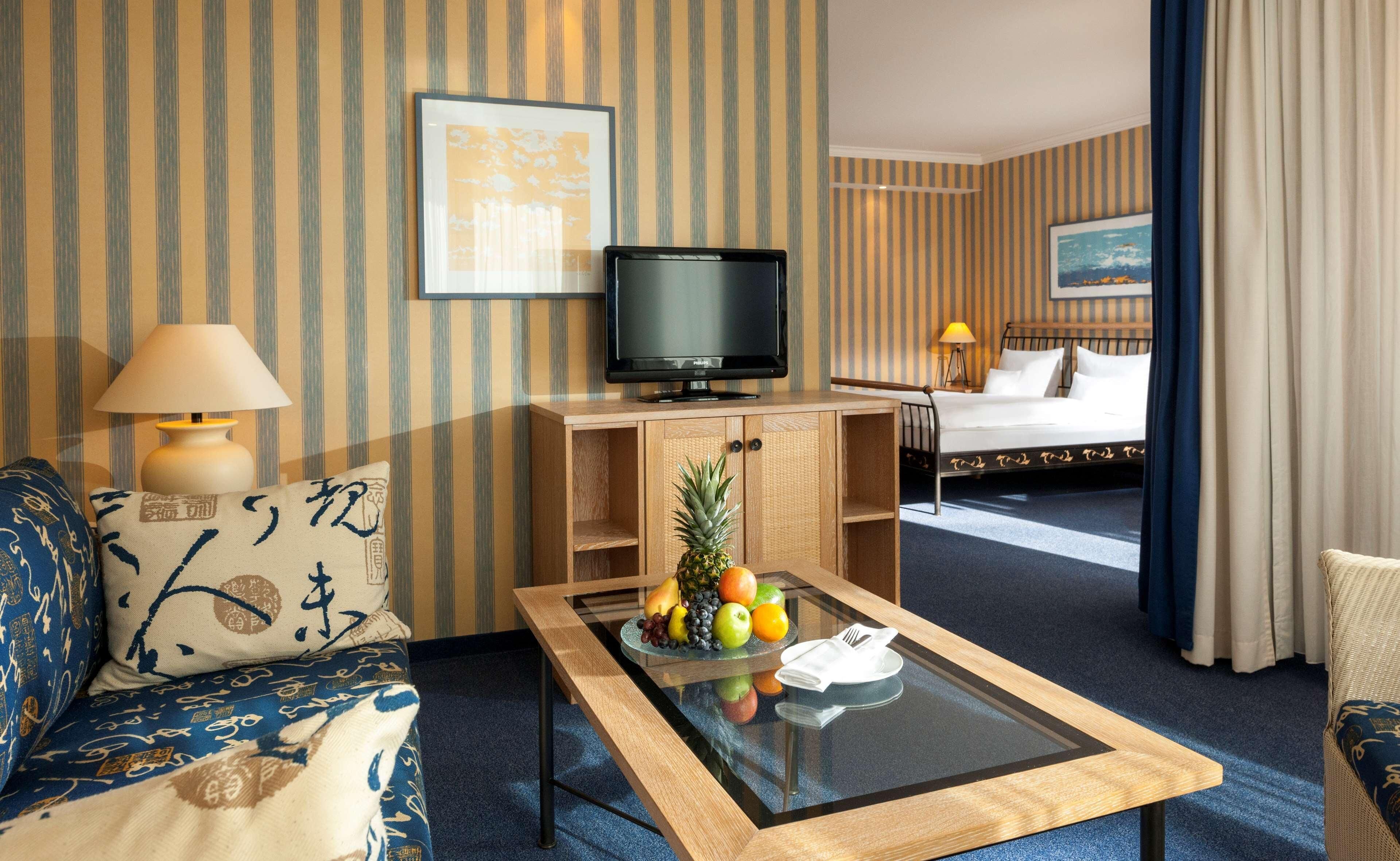 Hypo-allergenic bedding, minibar, in-room safe