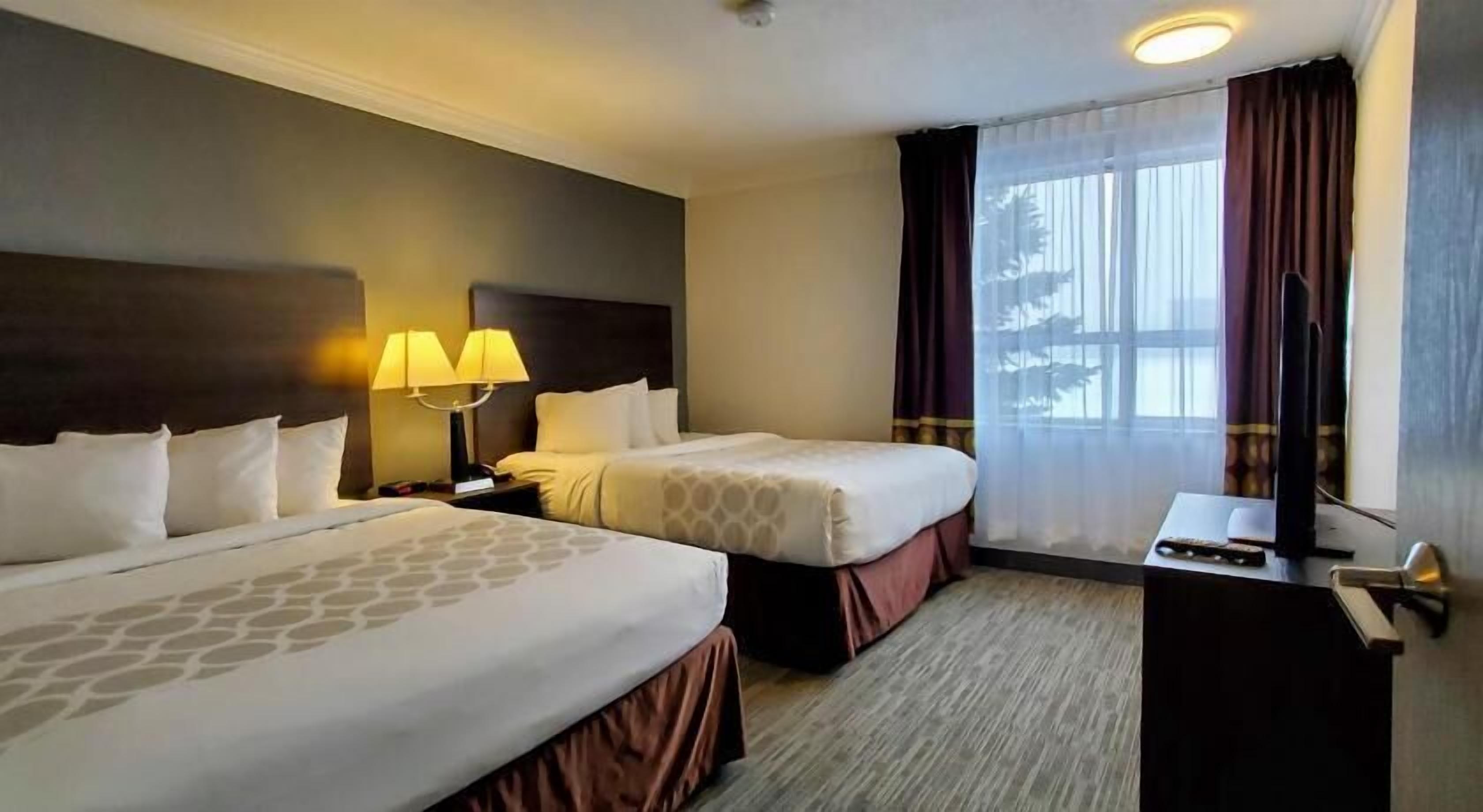 Desk, iron/ironing board, free cribs/infant beds, rollaway beds