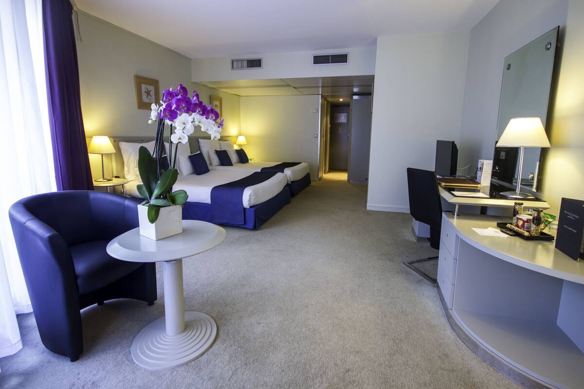 Family Room | Minibar, in-room safe, cribs (free), WiFi (free)