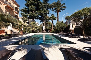 Seasonal outdoor pool, open 9:00 AM to 8:00 PM, pool umbrellas