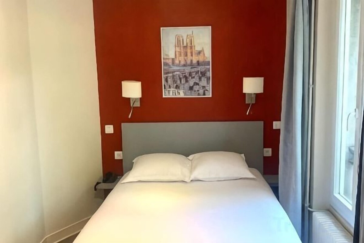 Desk, blackout drapes, iron/ironing board, WiFi (free)