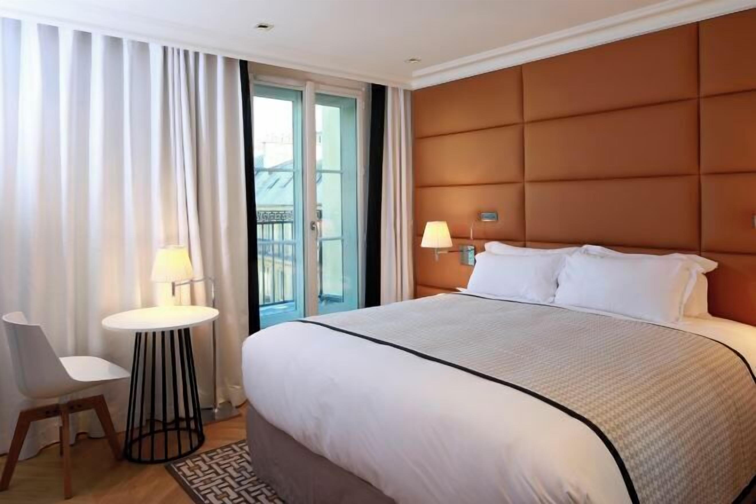 Tempur Pedic-bedden, een minibar, een kluis op de kamer, een bureau
