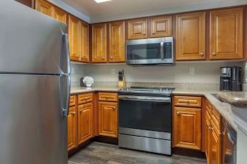 Microwave, coffee/tea maker, toaster, cookware/dishes/utensils at Hilton Grand Vacations Club SeaWorld® Orlando