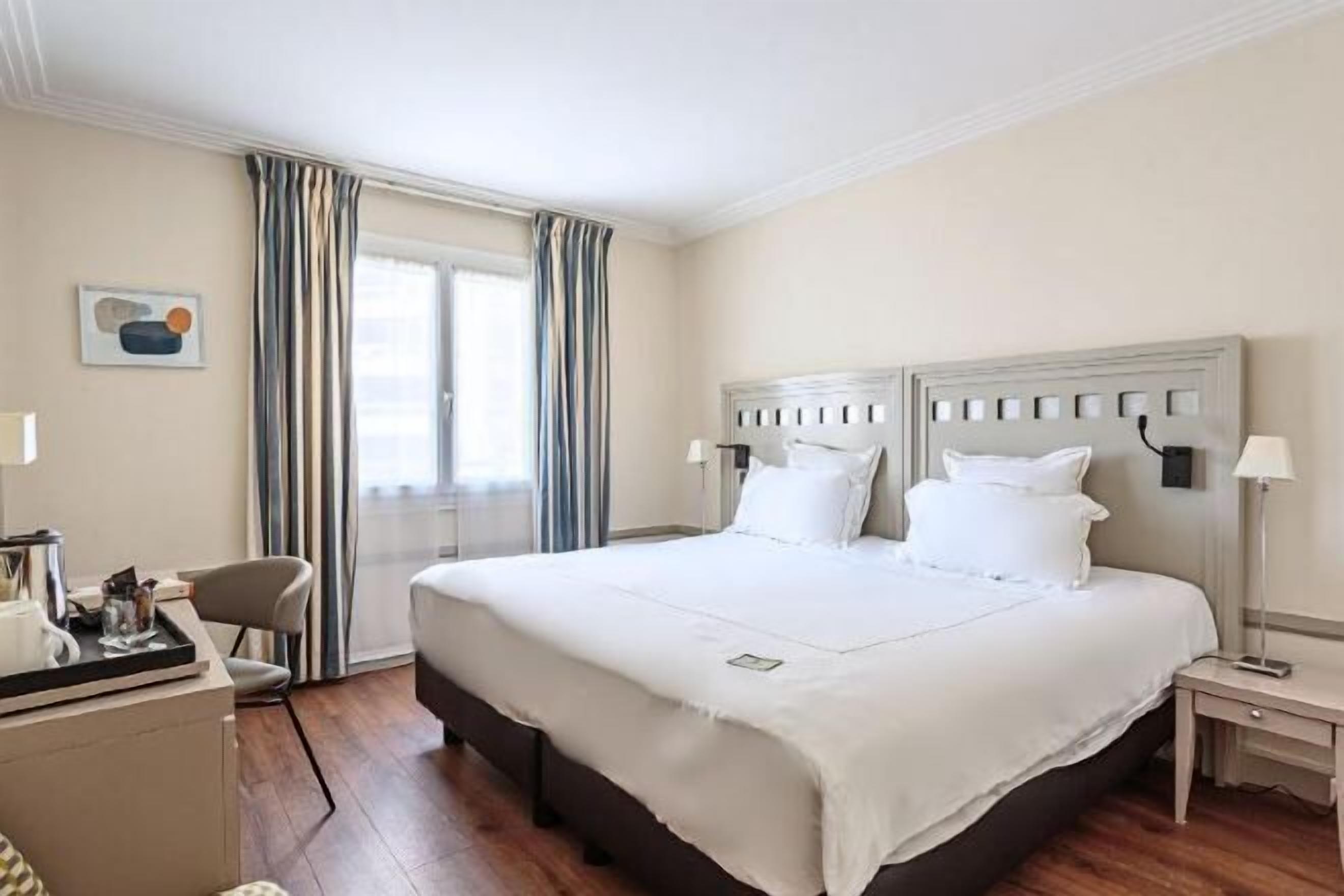 Premium bedding, in-room safe, desk, soundproofing