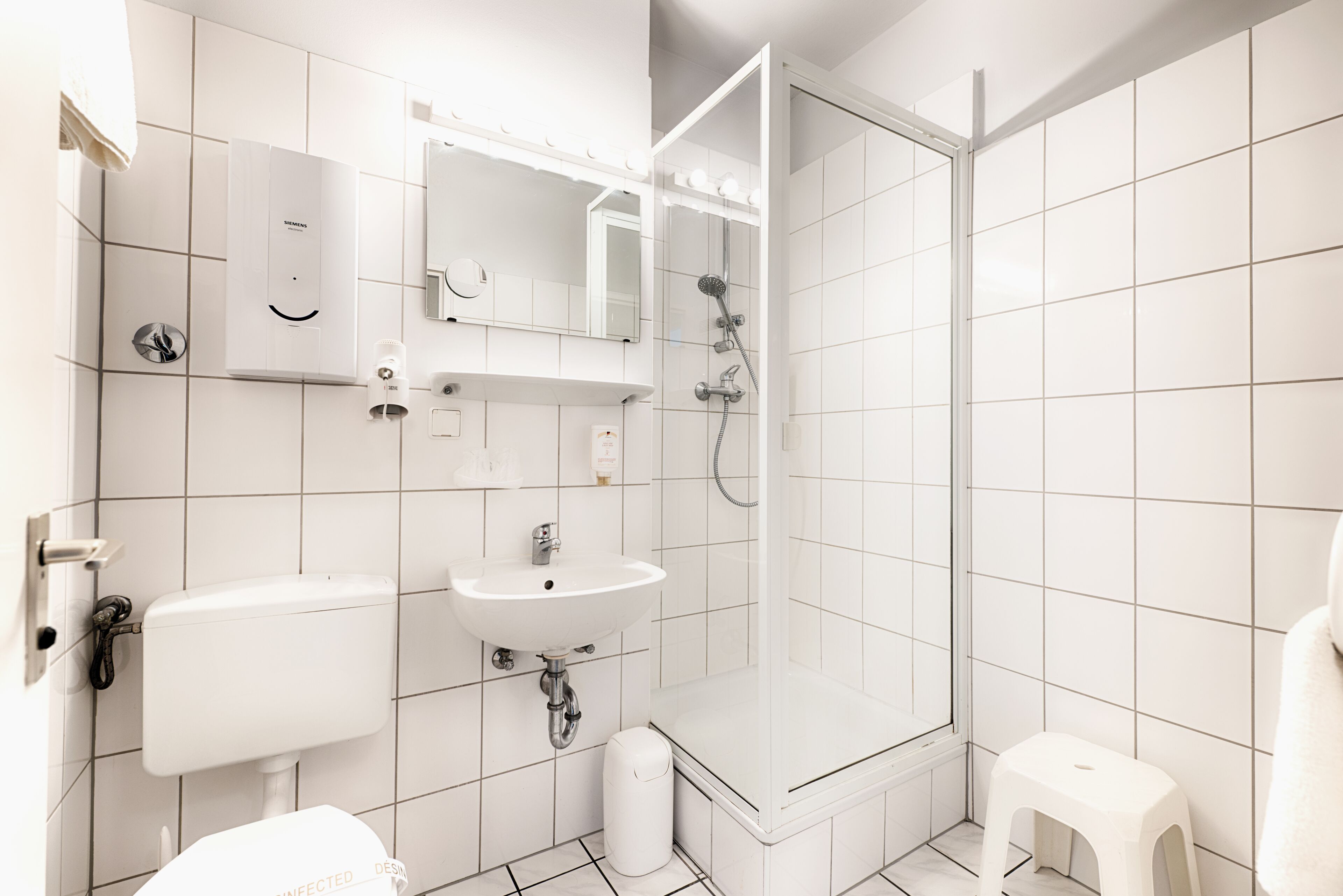 shower, free toiletries, hair dryer, towels